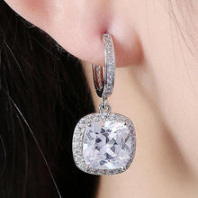 Load image into Gallery viewer, White Swarovski Asscher Cut Dangling Lever back Earrings in 14K White Gold
